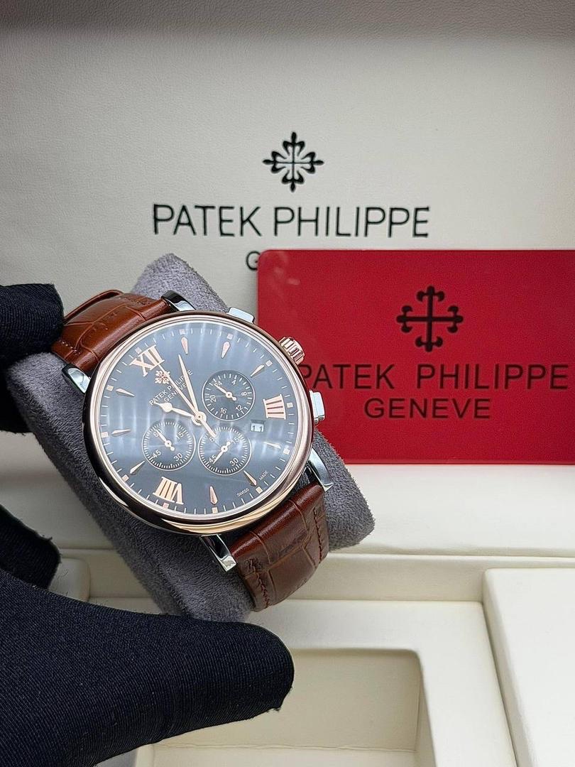 Patek Philippie chronograph watch featuring a sleek leather strap and polished case