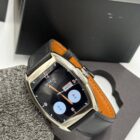 Black Dafit Franck Muller smartwatch with leather strap, showing a customizable watch face.