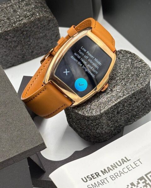 Brown Dafit Franck Muller smartwatch with leather strap displaying a custom watch face